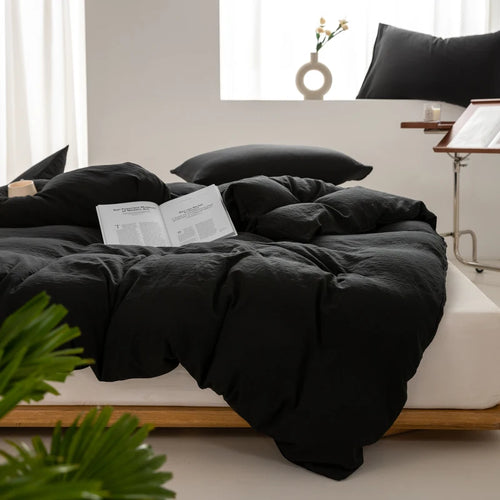 Détail de la housse de couette noire en coton lavé
